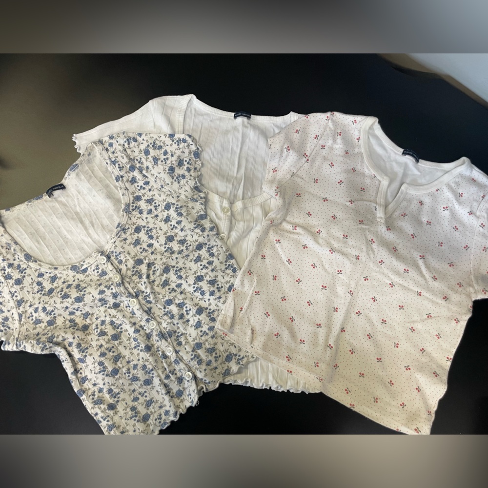 3 Brandy Melville White, Floral and cherries print tops